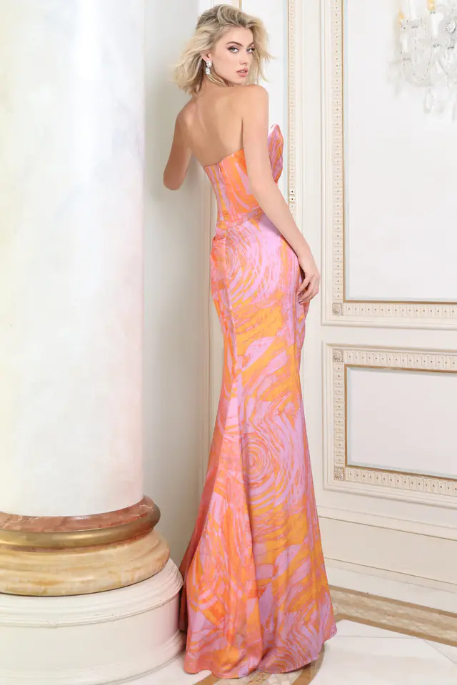 Back view of orange and pink print satin gown showing zip back and sweep train
