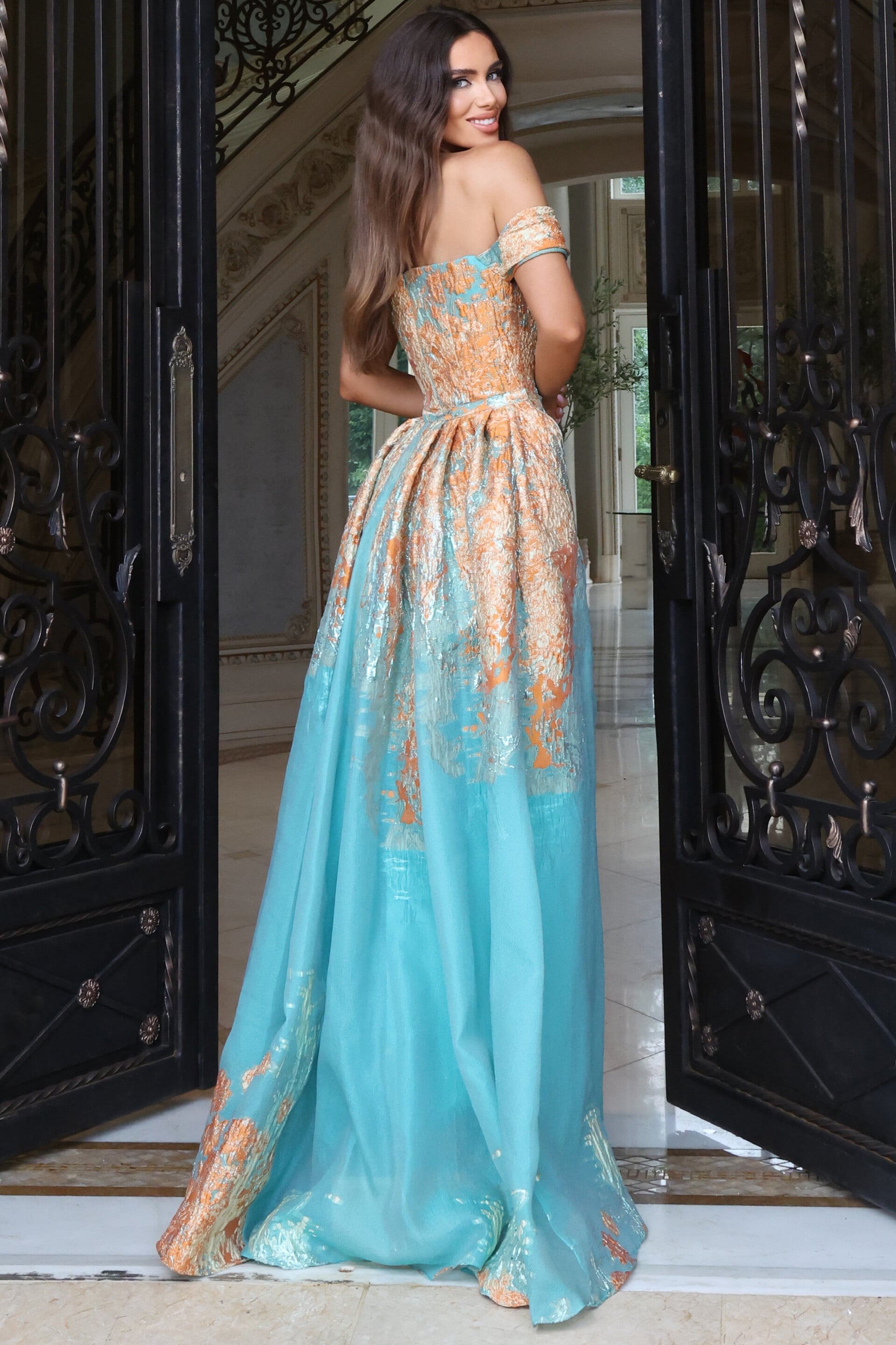 Turquoise and orange ombré metallic gown with off-the-shoulder neckline, back view