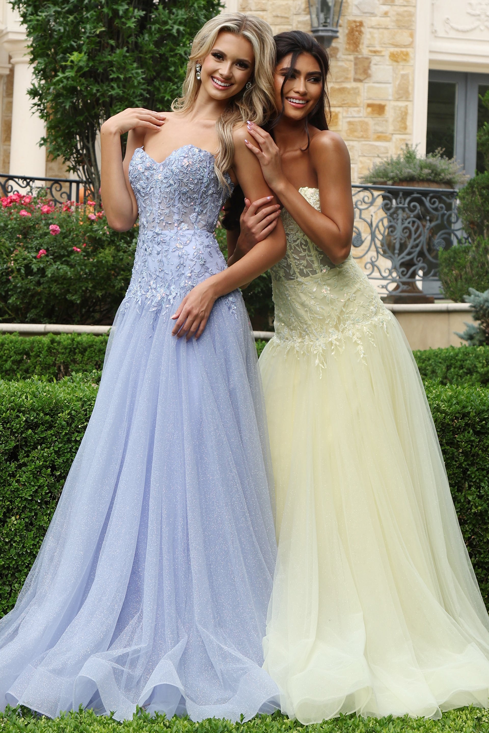 Periwinkle and yellow lace applique tulle gowns shown side by side