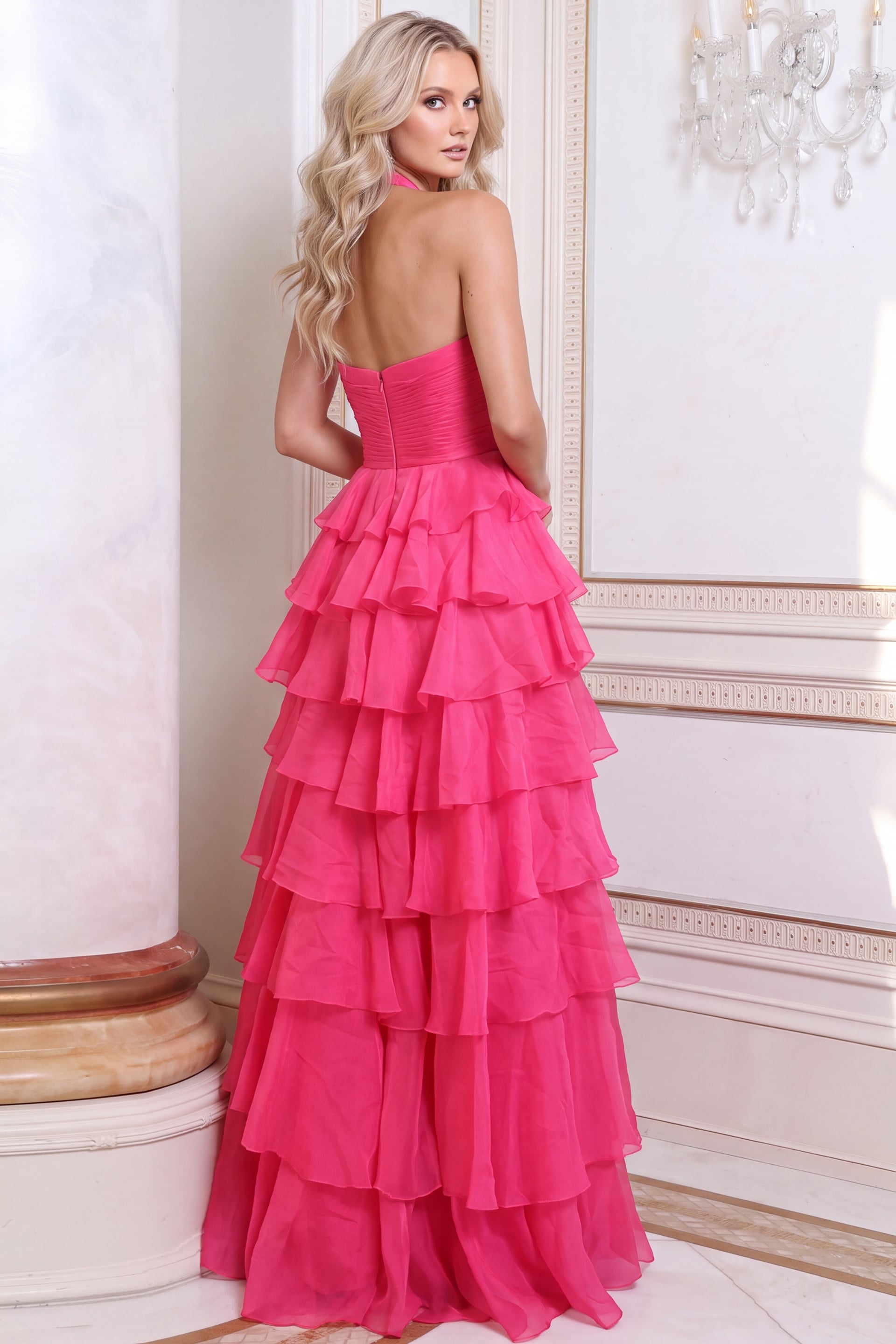 Back view of the fuchsia colorway showing halter back and tiered ruffle skirt