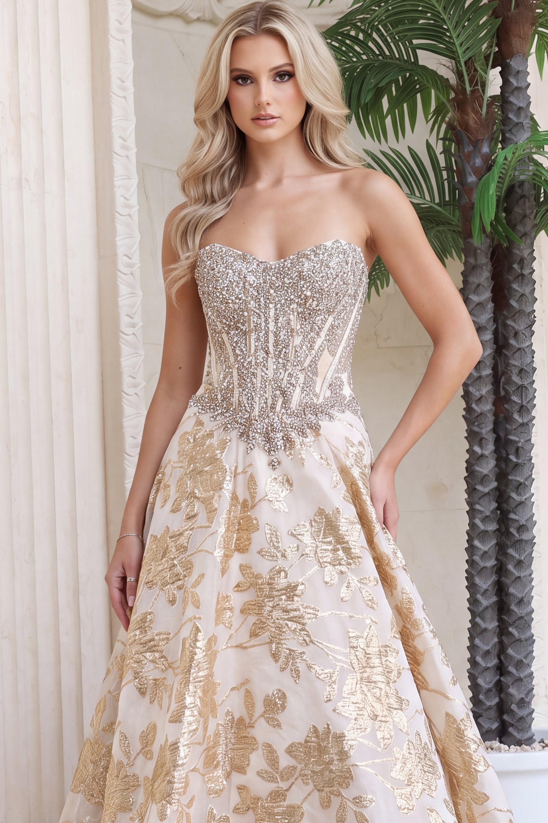 Close front view of ivory gold gown showing beaded corset bodice and sweetheart neckline