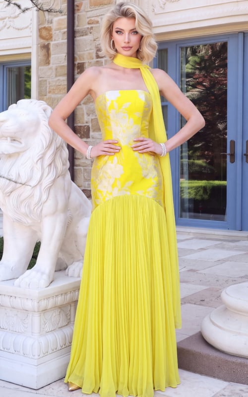 Yellow strapless gown with floral brocade and pleated skirt