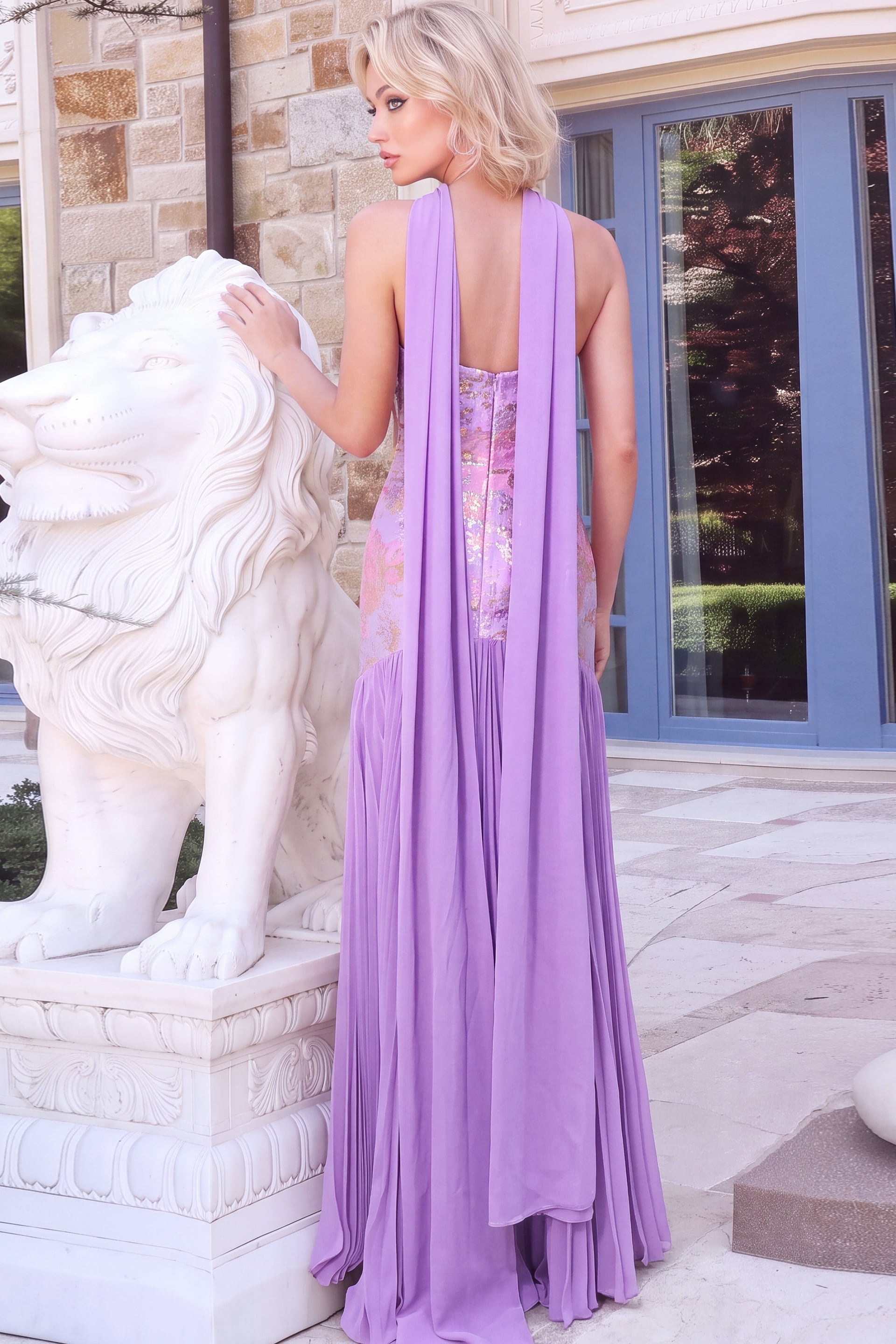 Lavender evening dress with flowing scarf and gold floral detail