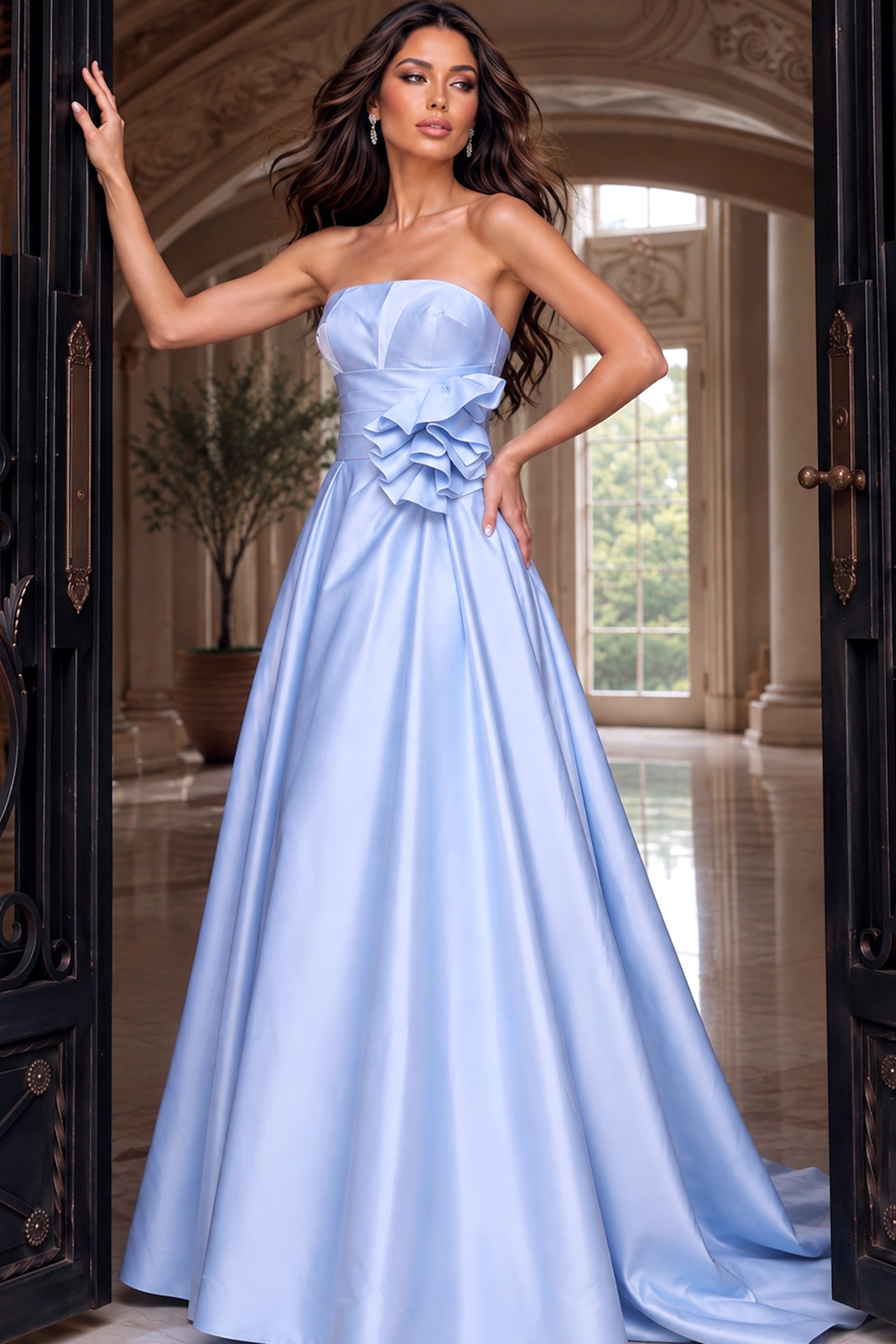Pale blue mikado gown with straight strapless bodice, waist rosette and long pleated skirt trailing behind