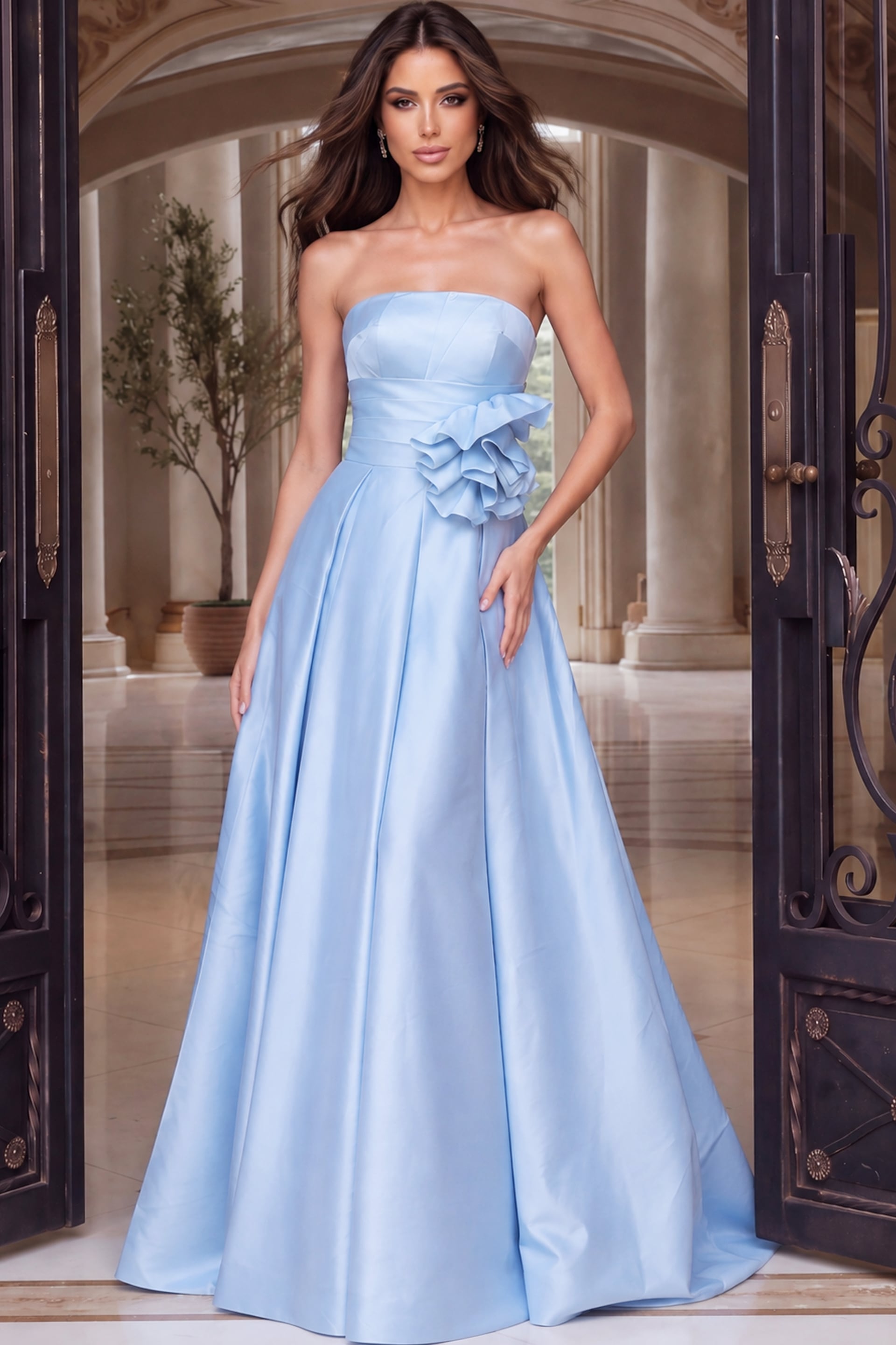 Floor-length ice blue satin gown with a straight strapless neckline and ruffled flower at the waist