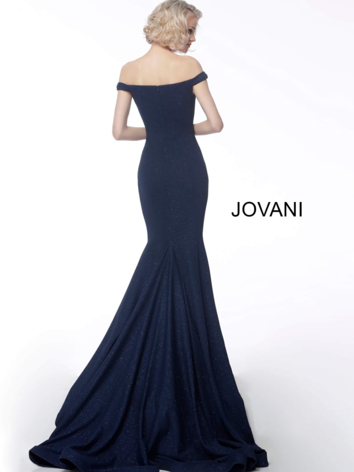 Model wearing Jovani 55187 navy dress from back