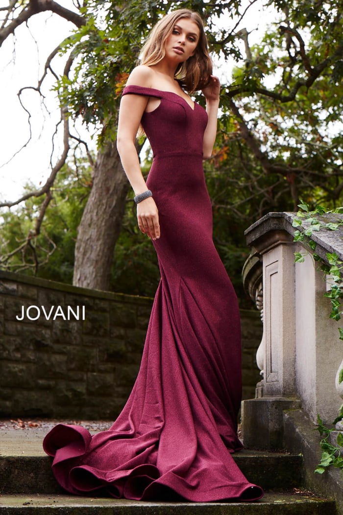Model wearing Jovani 55187 red dress back view