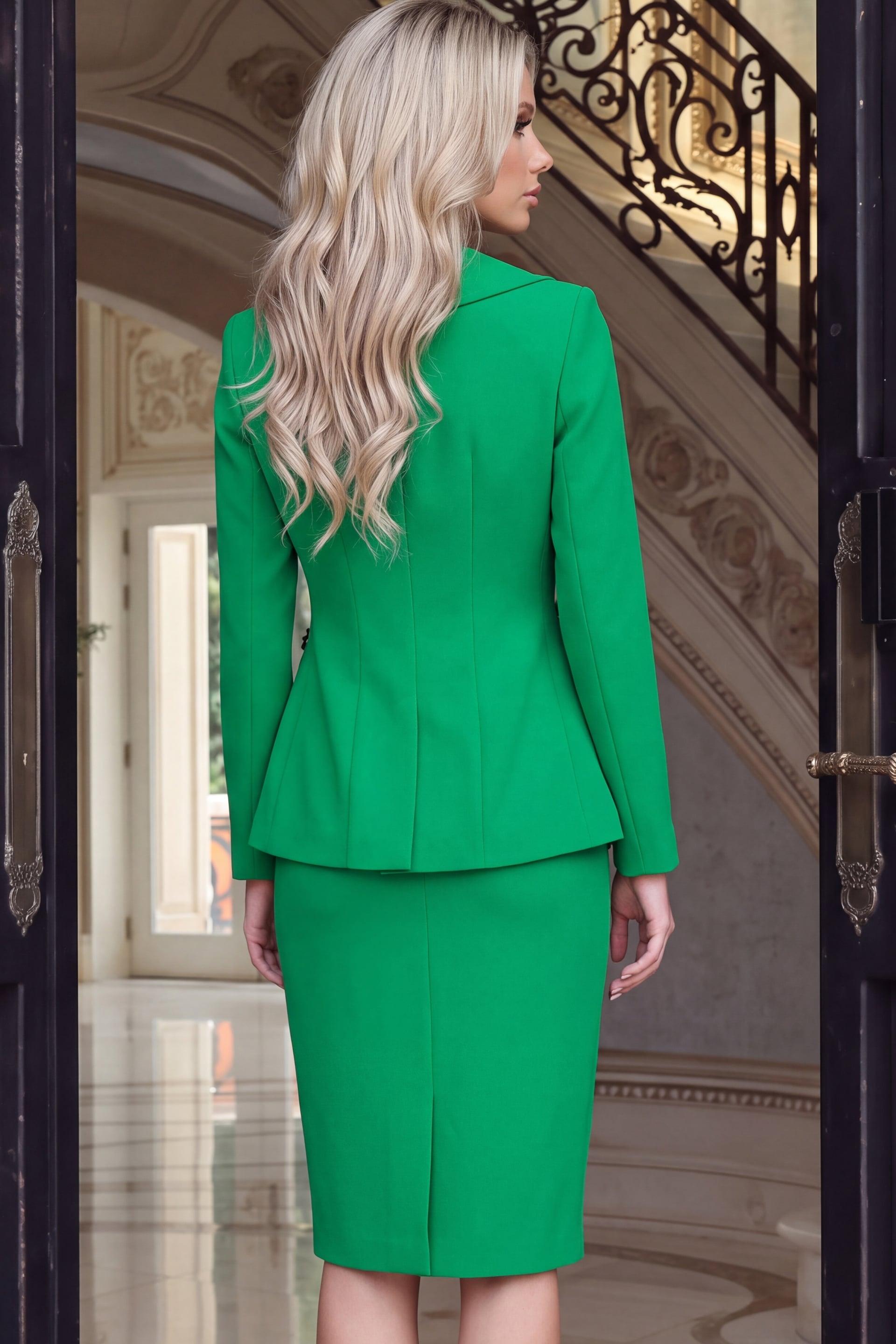 back view of green two piece blazer and pencil skirt suit