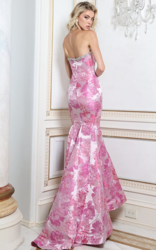 Back view of pink floral jacquard mermaid gown showing zip back and sweep train