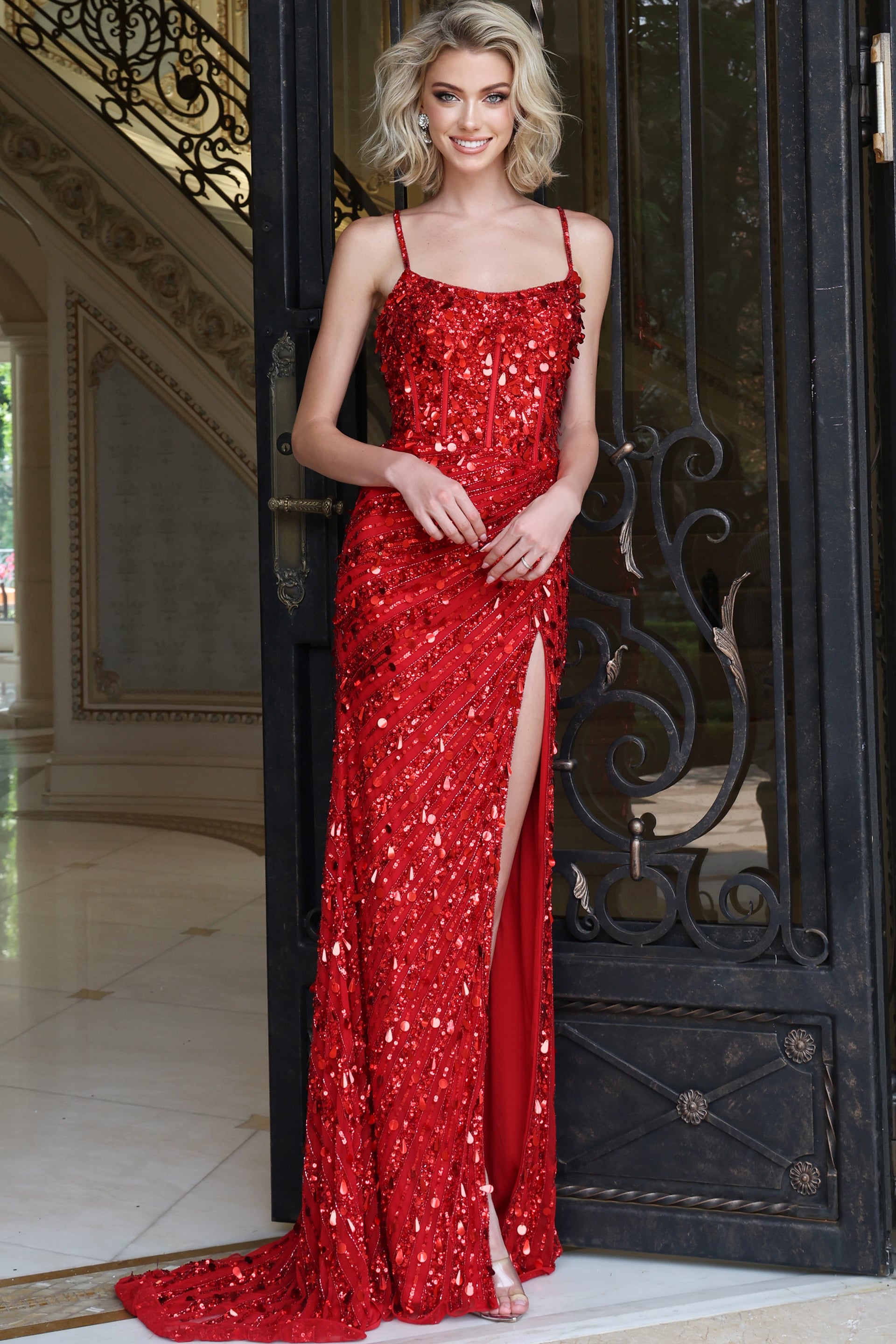 Red sequin column gown with straight neckline, spaghetti straps and high slit, front view
