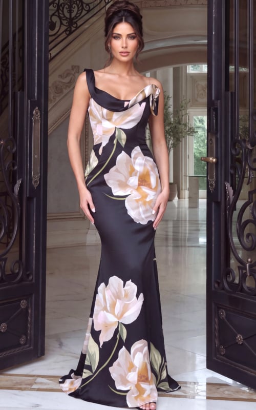 Cowl neck black satin gown splashed with painterly ivory blooms and slim shoulder straps.