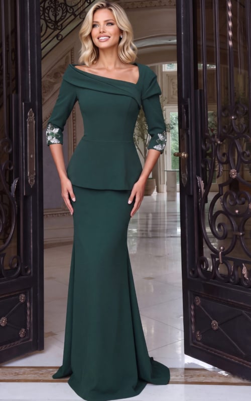 Emerald peplum gown with a folded asymmetric collar and beaded floral cuffs on elbow sleeves