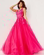 Model in Jovani 55634 fuchsia gown showing deep V-neckline and lace detail.