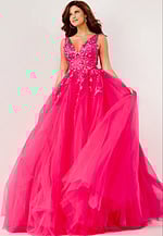 Model wearing Jovani 55634 fuchsia ball gown with V-neckline and lace appliques.