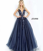 model wearing Jovani 55634 navy gown with deep V-neckline and lace applique
