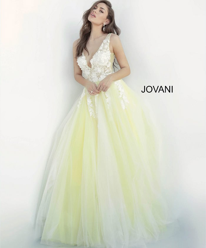 model wearing Jovani 55634 gown in white with yellow and lace applique