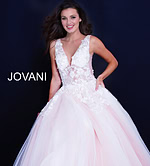 Models wearing Jovani 55634 white dress with floral designs.