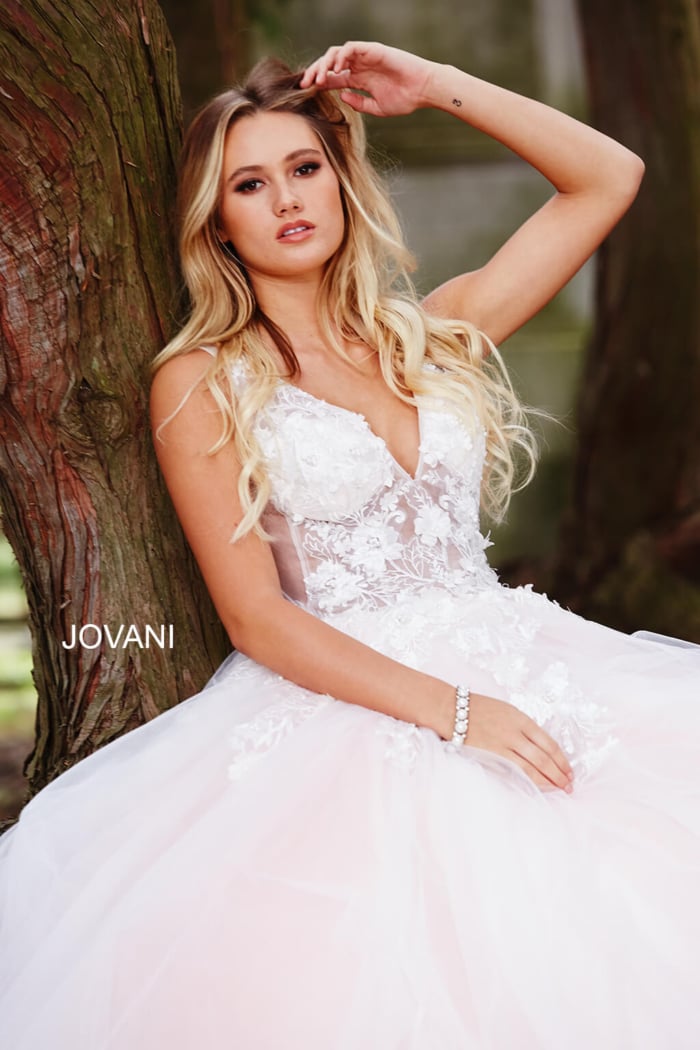 Model wearing Jovani 55634 Red Floral Appliques Dress 2023