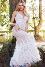 Front view of model in Jovani 55796 ivory dress with beaded bodice and elegant design.