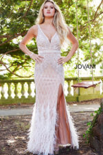 Model wearing Jovani 55796 ivory gown from the front, showcasing V-neckline and feathered skirt.