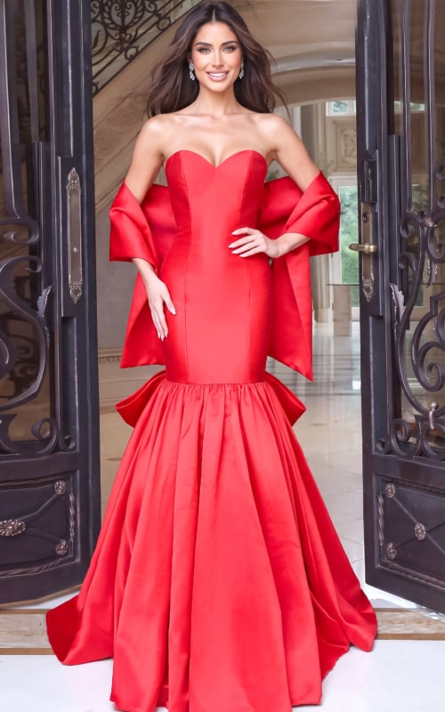Red floor-length strapless prom dress with sculpted bodice, mermaid silhouette, and elegant satin finish.
