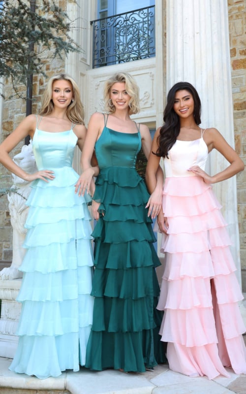 Three models wearing the tiered ruffle chiffon gown in aqua, emerald green and blush pink