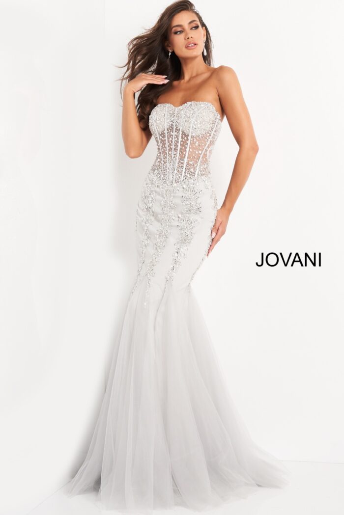 Model in sparkling silver Jovani 5908 gown.