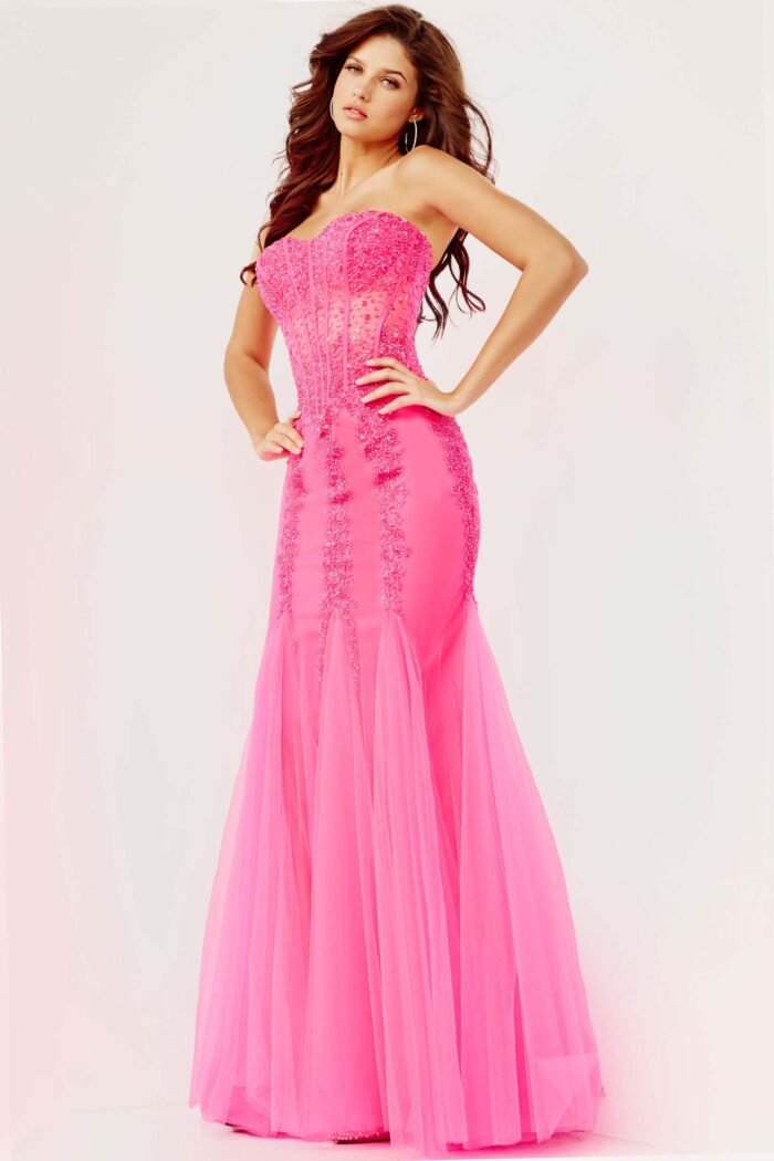 Model in Jovani 5908 neon pink striking dress.