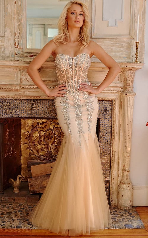 Model wearing Jovani 5908 beige gown with intricate beaded embellishments.
