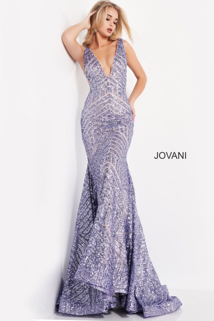 Model wearing Jovani 59762 purple gown featuring a fitted bodice and intricate sequin patterns.