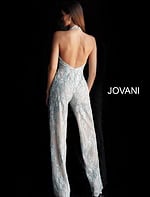 Back view of Jovani 60124 dress in light blue, showcasing open back design and sheer overlay.