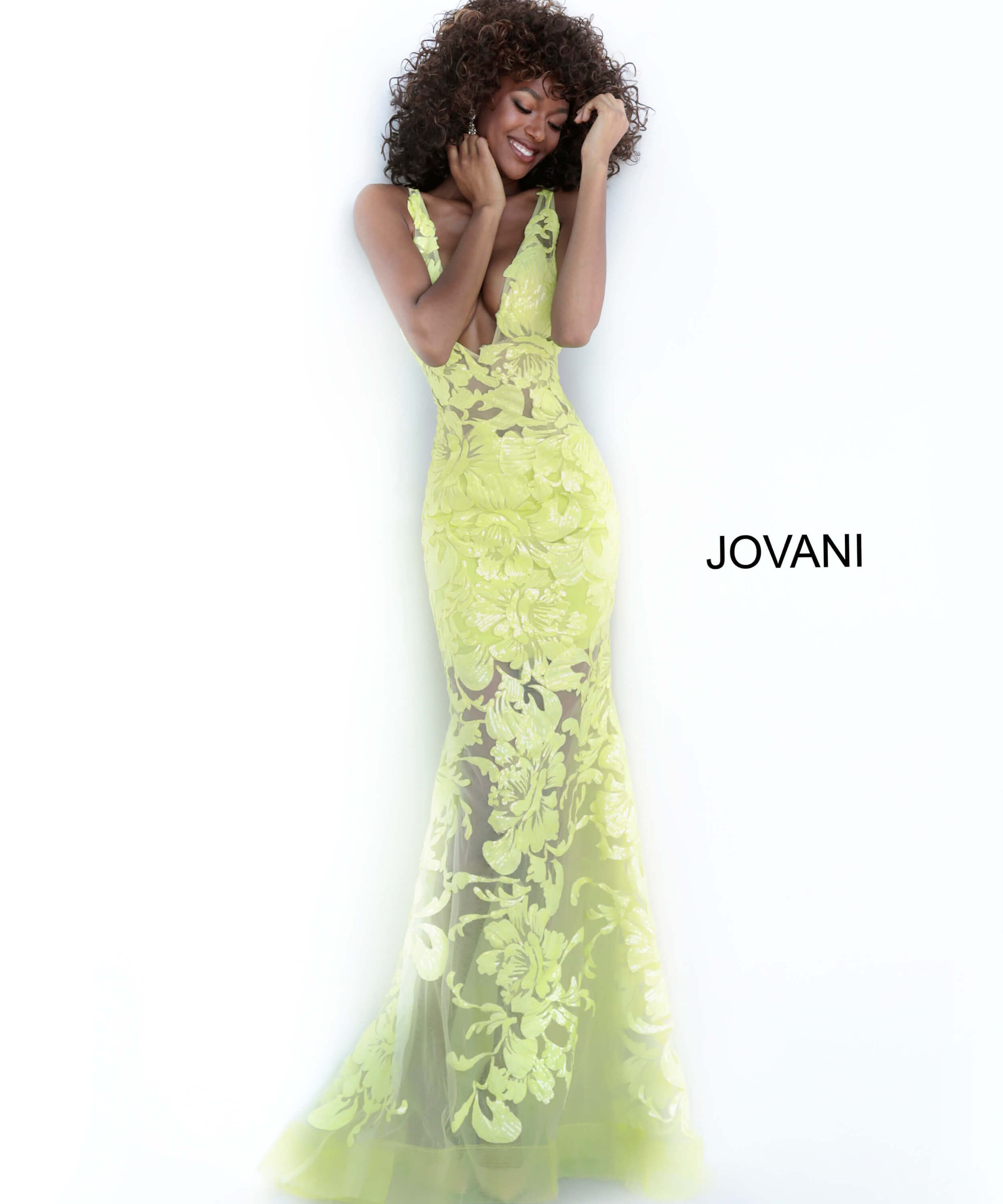 Model wearing Jovani 60283 Light Blue Floral Appliques Prom Dress