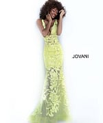 Model in Jovani 60283 yellow floral lace mermaid gown.