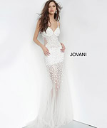 Model posing in Jovani 60695 gown in white, showcasing its elegant floral design, front view.
