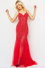 Model wearing Jovani 60695 gown in red with floral appliques, front view.