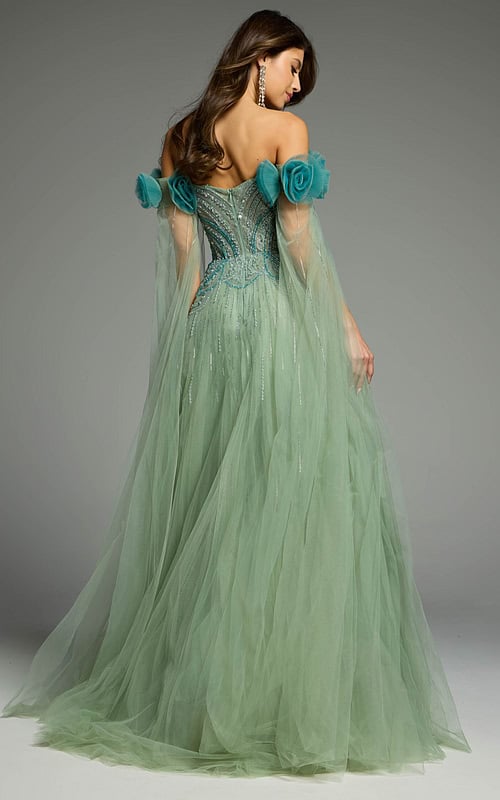 Back view of a green tulle dress showcasing layered elegance