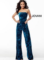 Model showcasing Jovani 61740 teal blue jumpsuit, featuring a strapless style and wide-leg cut.