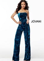 Model wearing Jovani 61740 teal blue jumpsuit, showing off the elegant design with wide-leg pants.
