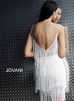 Model wearing Jovani 61883 Teal Fringe Spaghetti Strap Cocktail Dress
