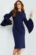 Model wearing Jovani 63169 navy dress with elegant ruffled sleeves, front view close-up.