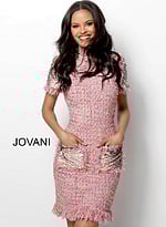 Model smiling in Jovani 63219 pink dress with high neckline and short sleeves.