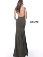 Model wearing Jovani 63563 olive green dress with low back and embellishments, back view.