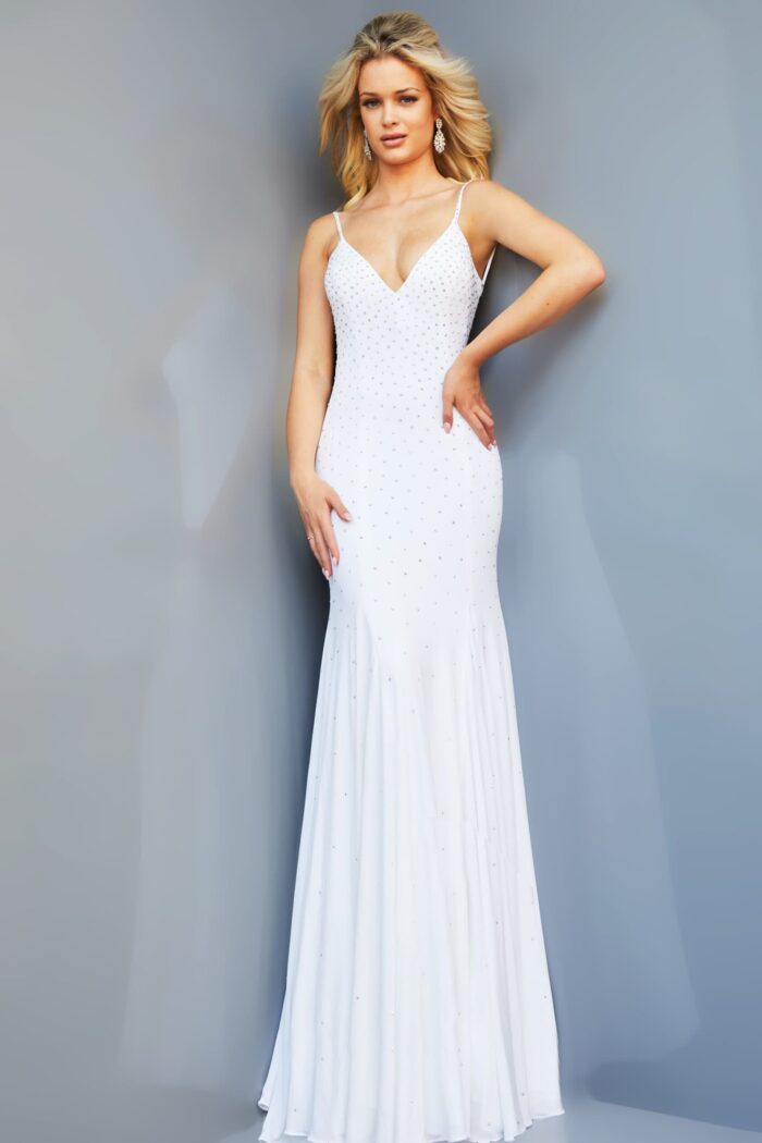 Model wearing Jovani 63563 white dress with mermaid silhouette and sparkling details, front view.