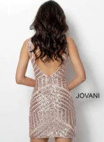 Model wearing Jovani 63899 blush sequin mini dress, back view.