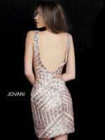 Model wearing Jovani 63899 red sequin mini dress, back view.