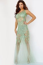 Model wearing Jovani 6395 pale green gown with intricate beaded design on sheer fabric.