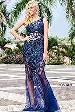 Model wearing Jovani 6395 navy gown featuring an asymmetrical neckline and sequined details.