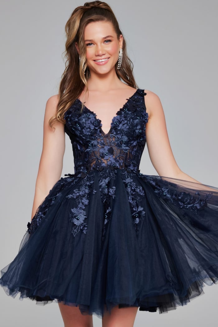 Navy Jovani 63987 model showcasing dress's low back.