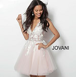 Model in Jovani 63987 dress, front view with delicate floral design.