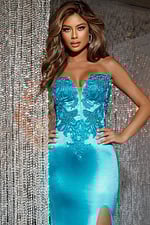 Close-up of model wearing Jovani D5048 blue dress with elegant lace bodice and sweetheart neckline.